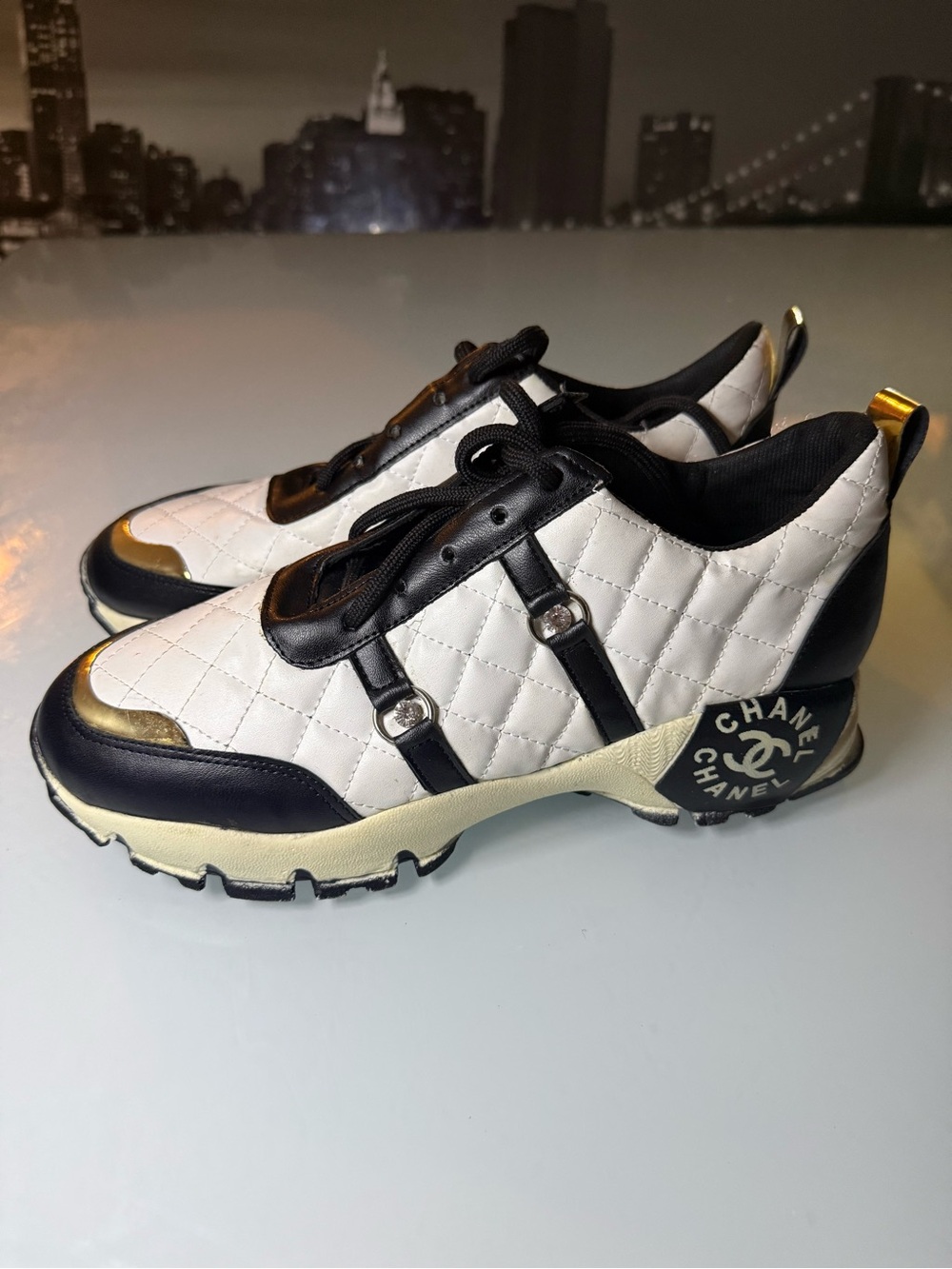 CHANEL White, Black & Gold Quilted Kids Sneakers